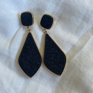 Light white black and gold earring